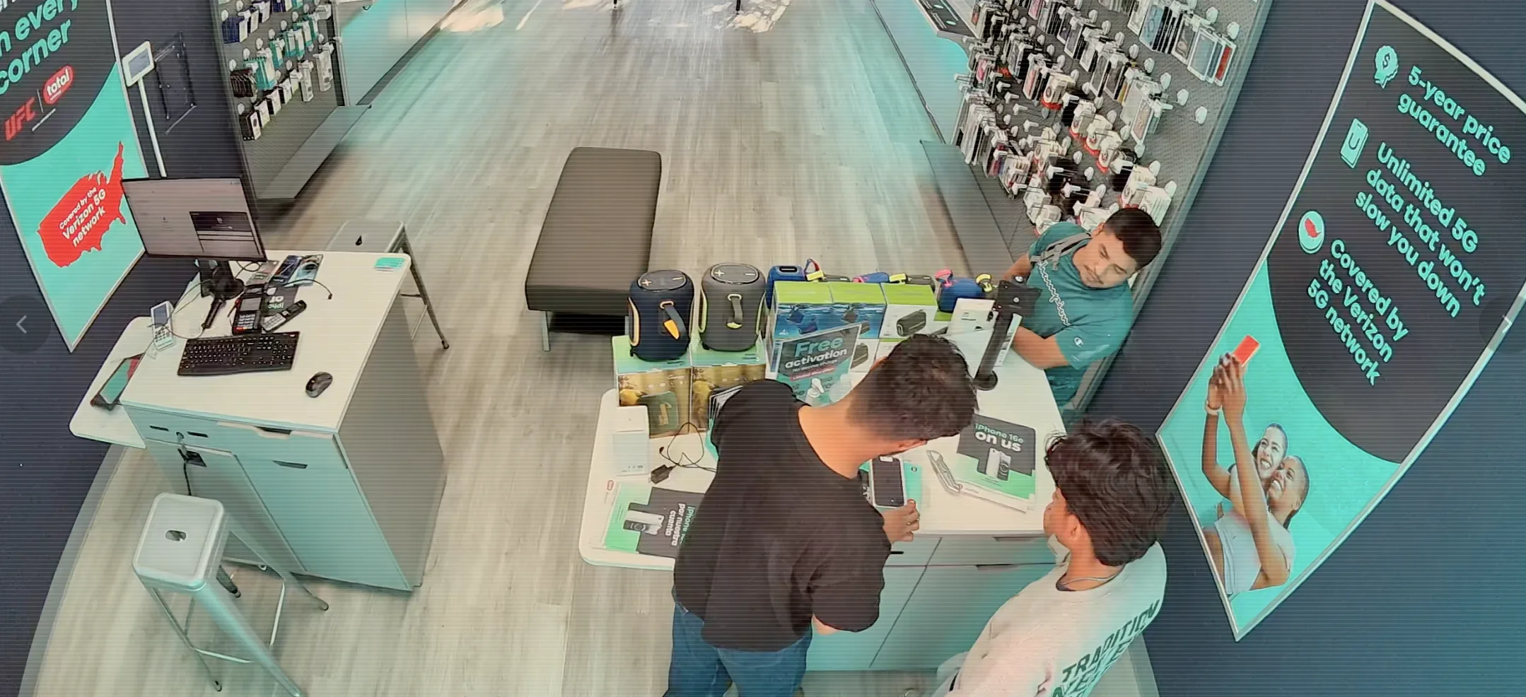 Surveillance view of a customer interaction at the Peachtree Blvd store